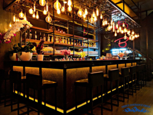 A busy bar in Colorado, highlighting the importance of bar insurance for liquor liability protection and legal compliance.