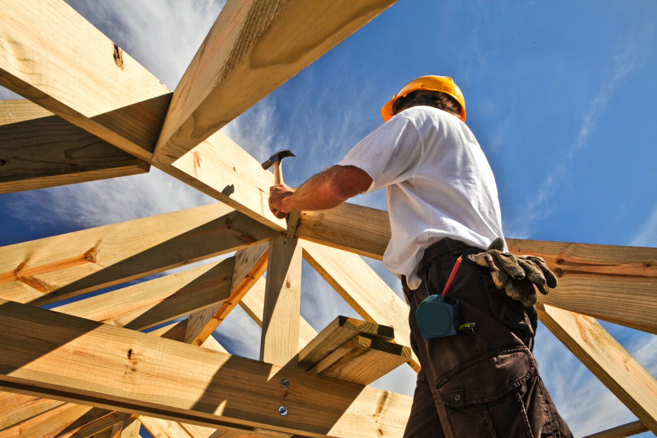 A Colorado construction site with workers and equipment, illustrating coverage protection under Home Builders Insurance.